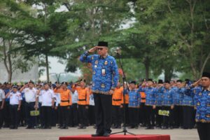 PJ Sekretaris Kabupaten Tulang Bawang Ferli Yuledi,SP,MM,MT Sebagai Pembina Upacara Dalam Rangka HUT KORPRI Ke-52 Serta SAT-POL PP Tulang Bawang